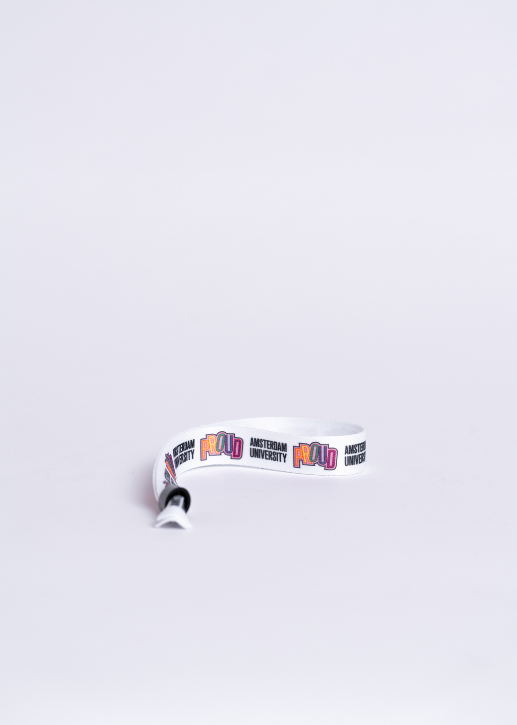 Wristbands with the University of Amsterdam and Proud logo