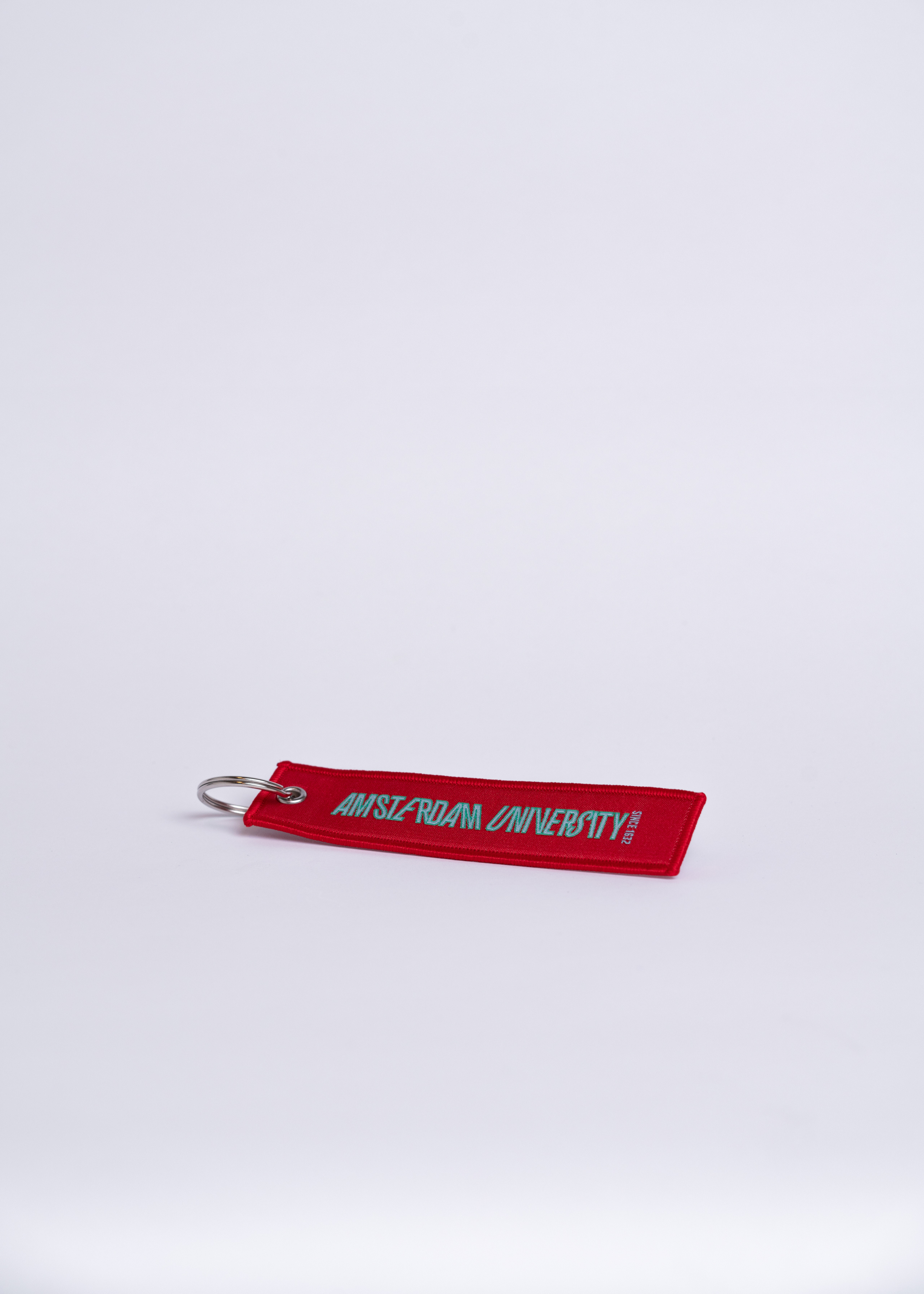 Keychain with the Amsterdam University logo