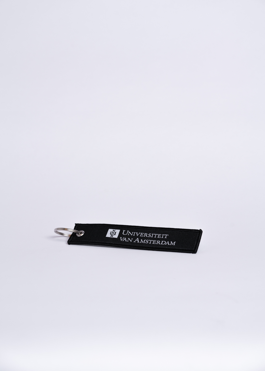 Keychain with the University of Amsterdam logo